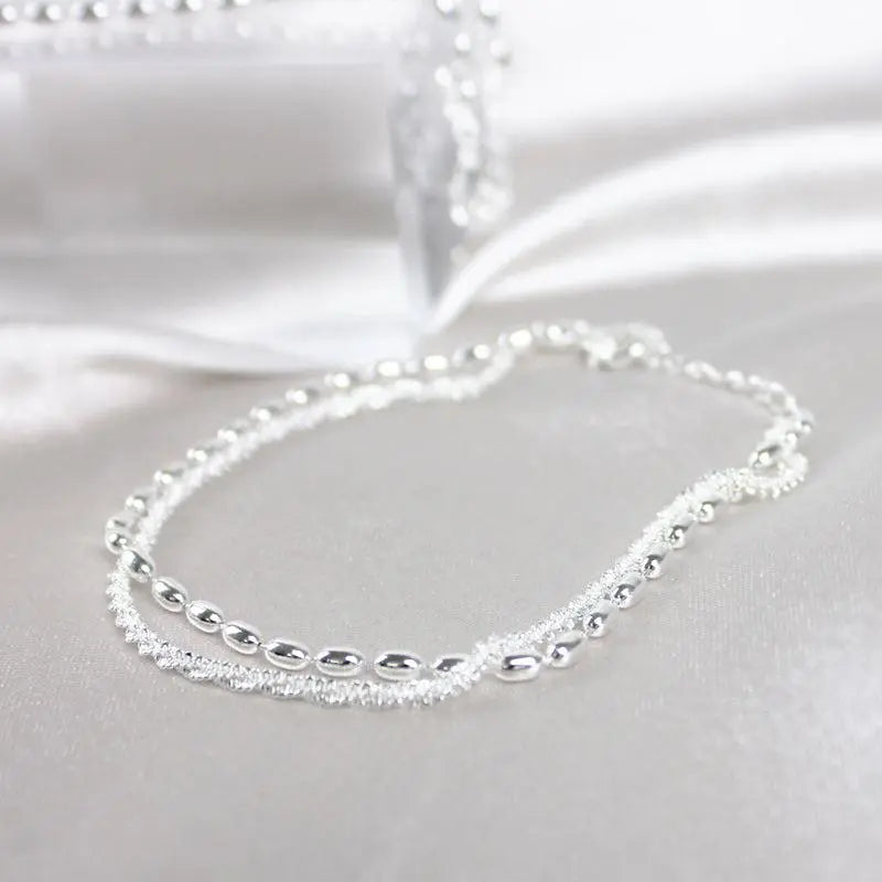 Elegantes silbernes Armband-Set mit Zirkonia Steinen