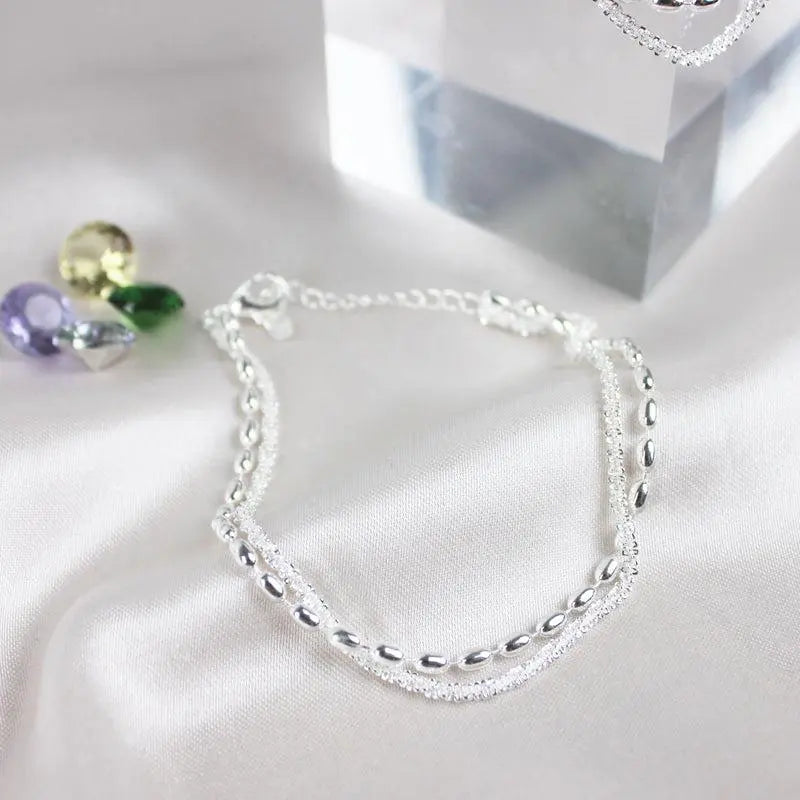 Elegantes silbernes Armband-Set mit Zirkonia Steinen