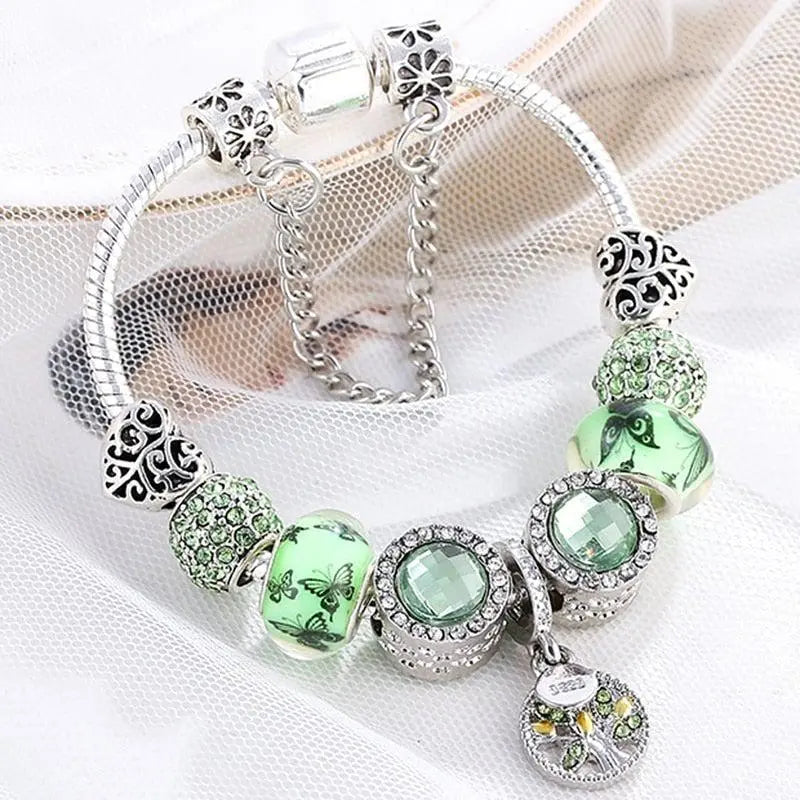 Elegantes Armband in Silber mit grünem Kristall
