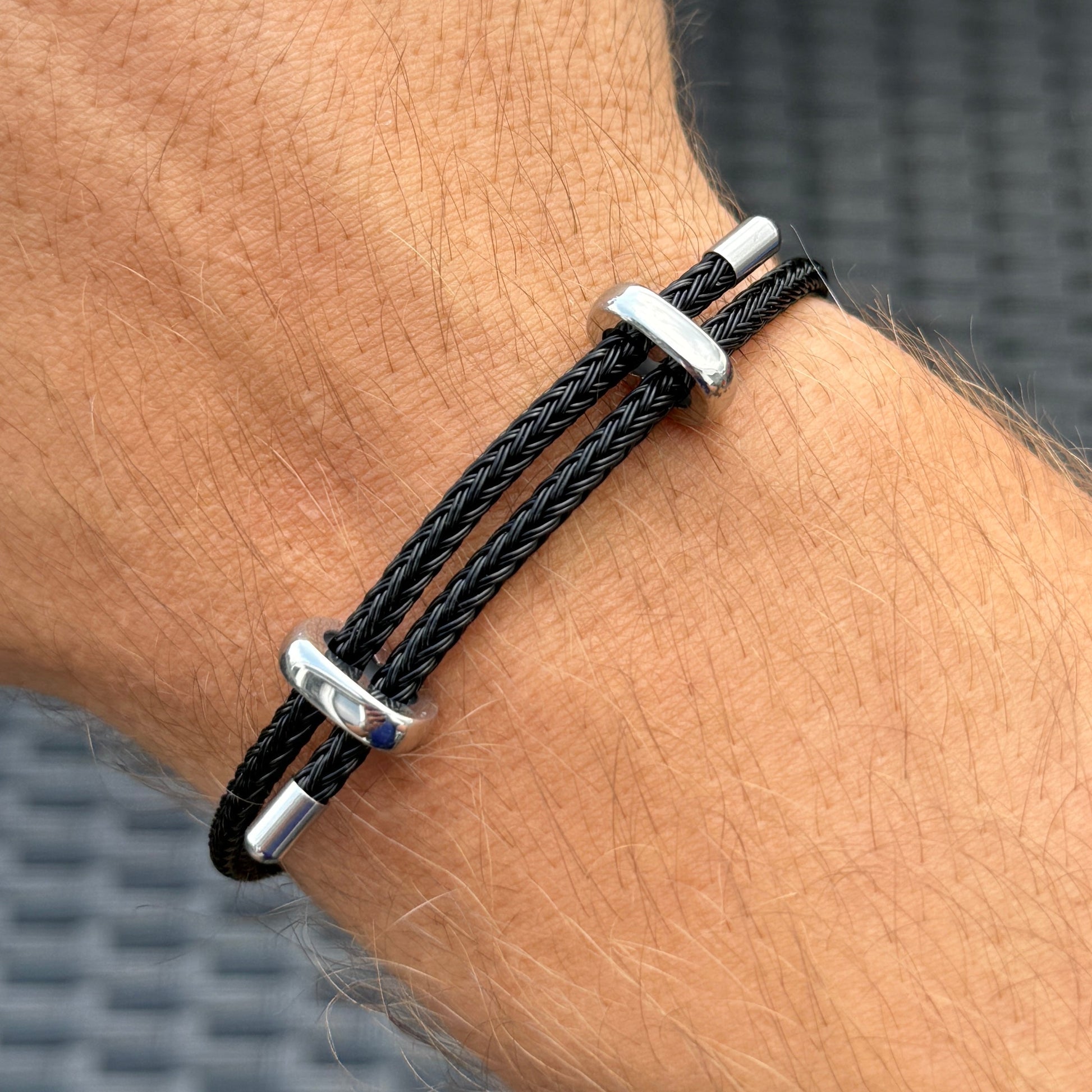 Woven steel rope armband silver black